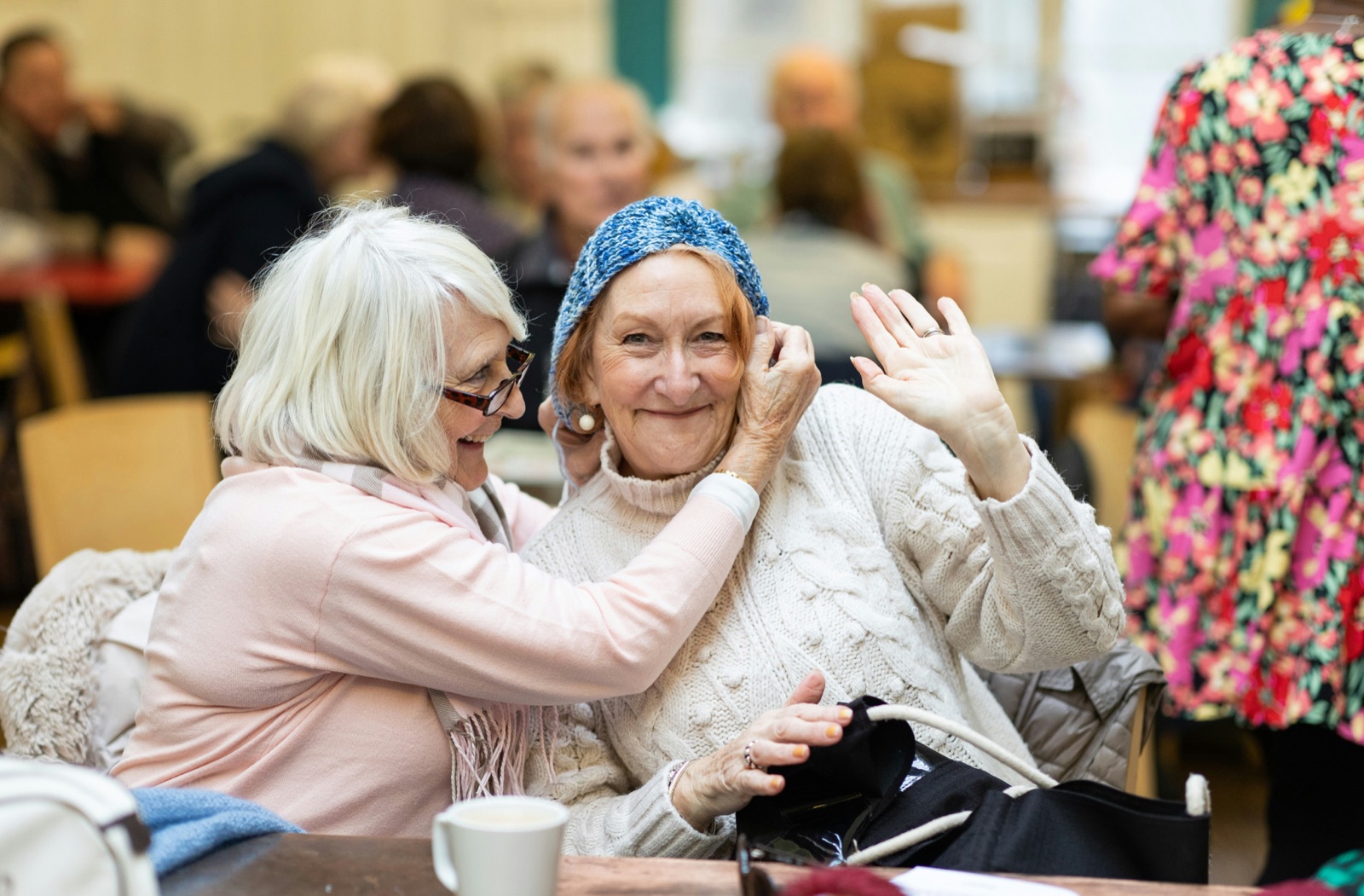Residents relaxing together indoors
