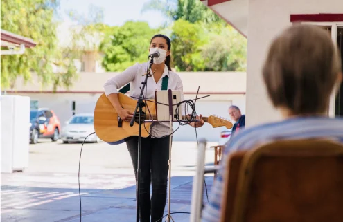 Residents enjoying live music together